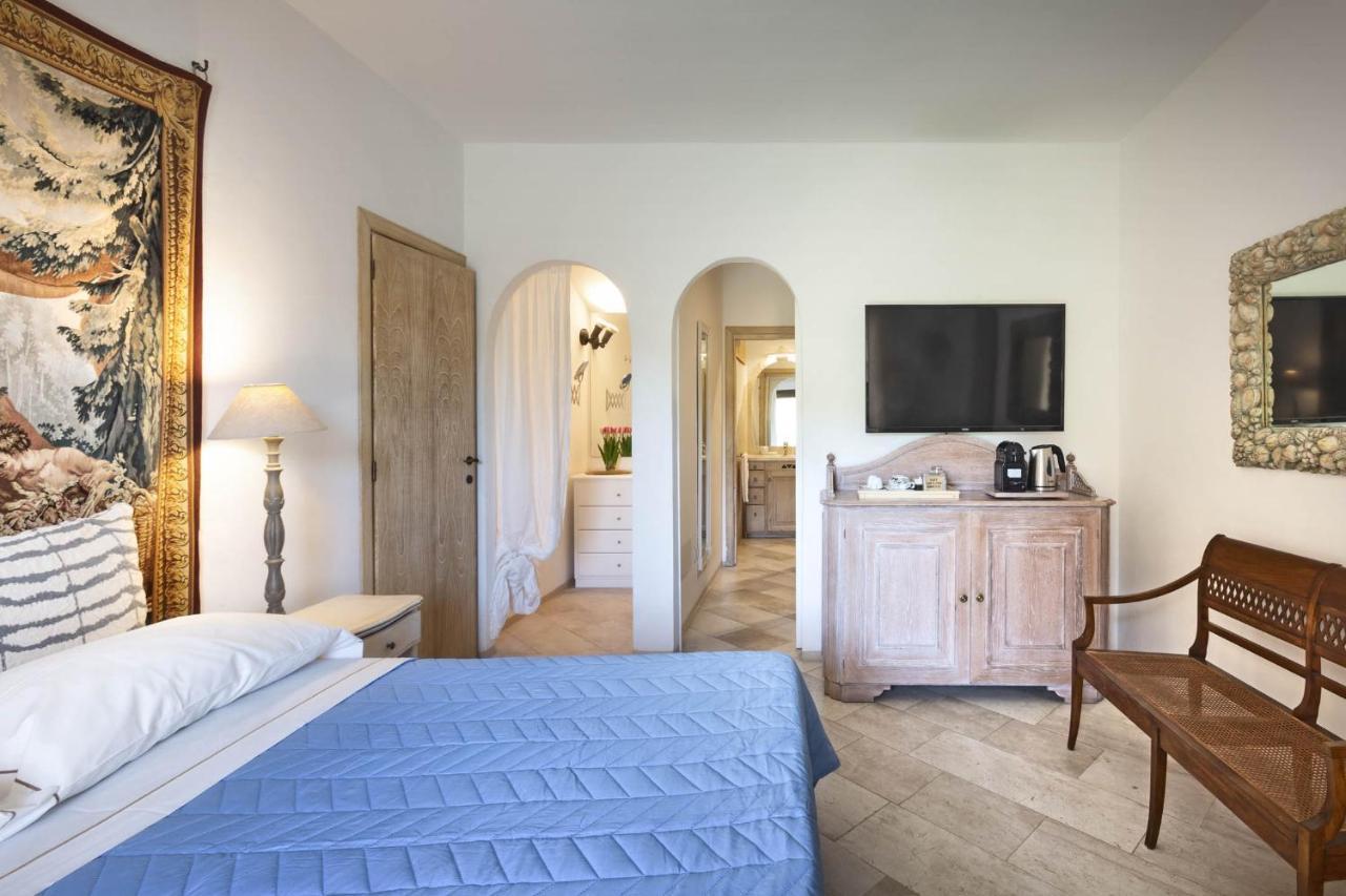 Iconic Luxury Suites Abbiadori Bagian luar foto