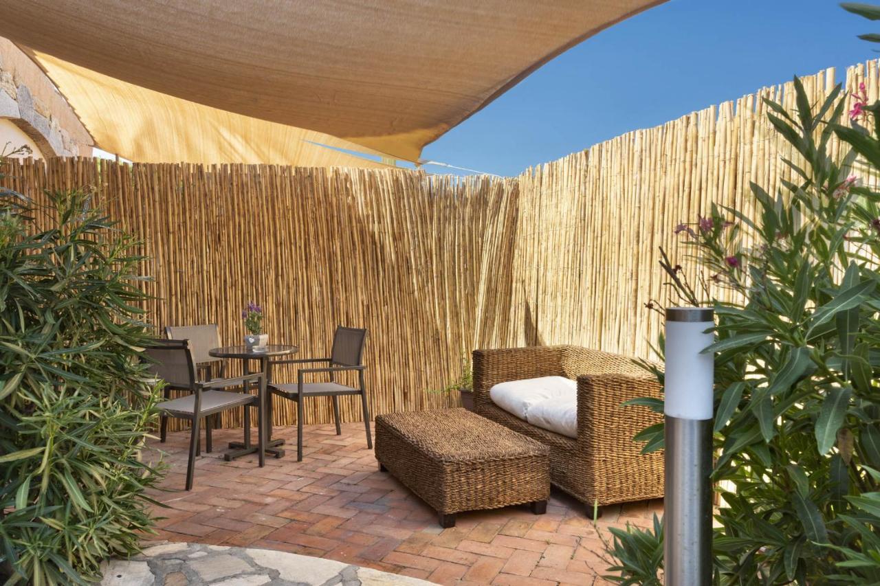 Iconic Luxury Suites Abbiadori Bagian luar foto